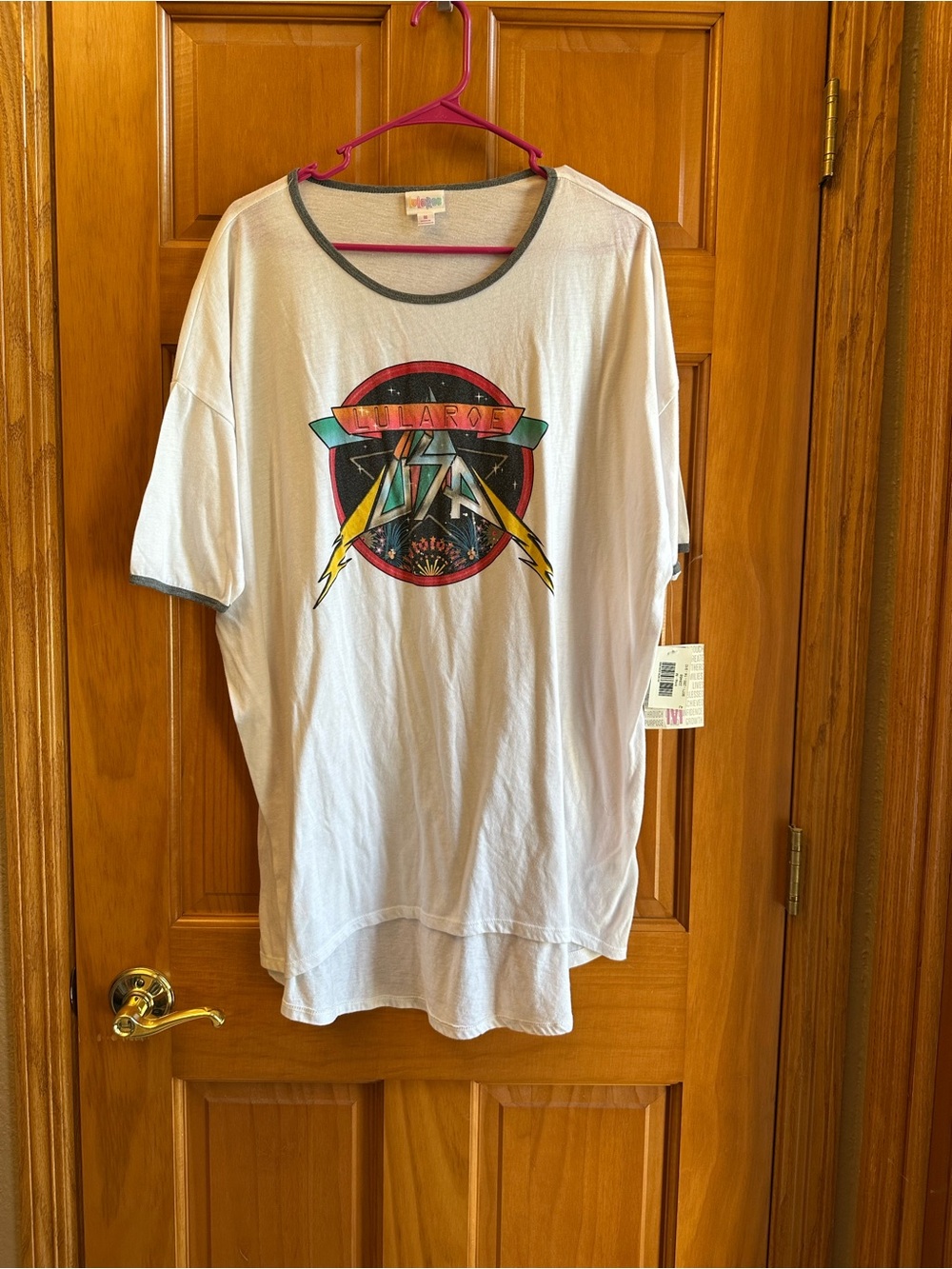 LuLaRoe Irma White Tee with Multicolor Retro Crest